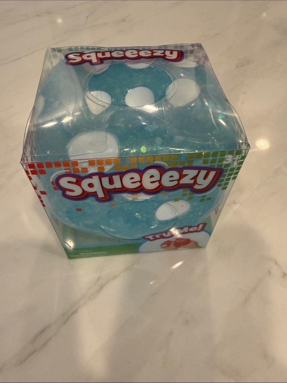 Blue dice Squeeezy toy